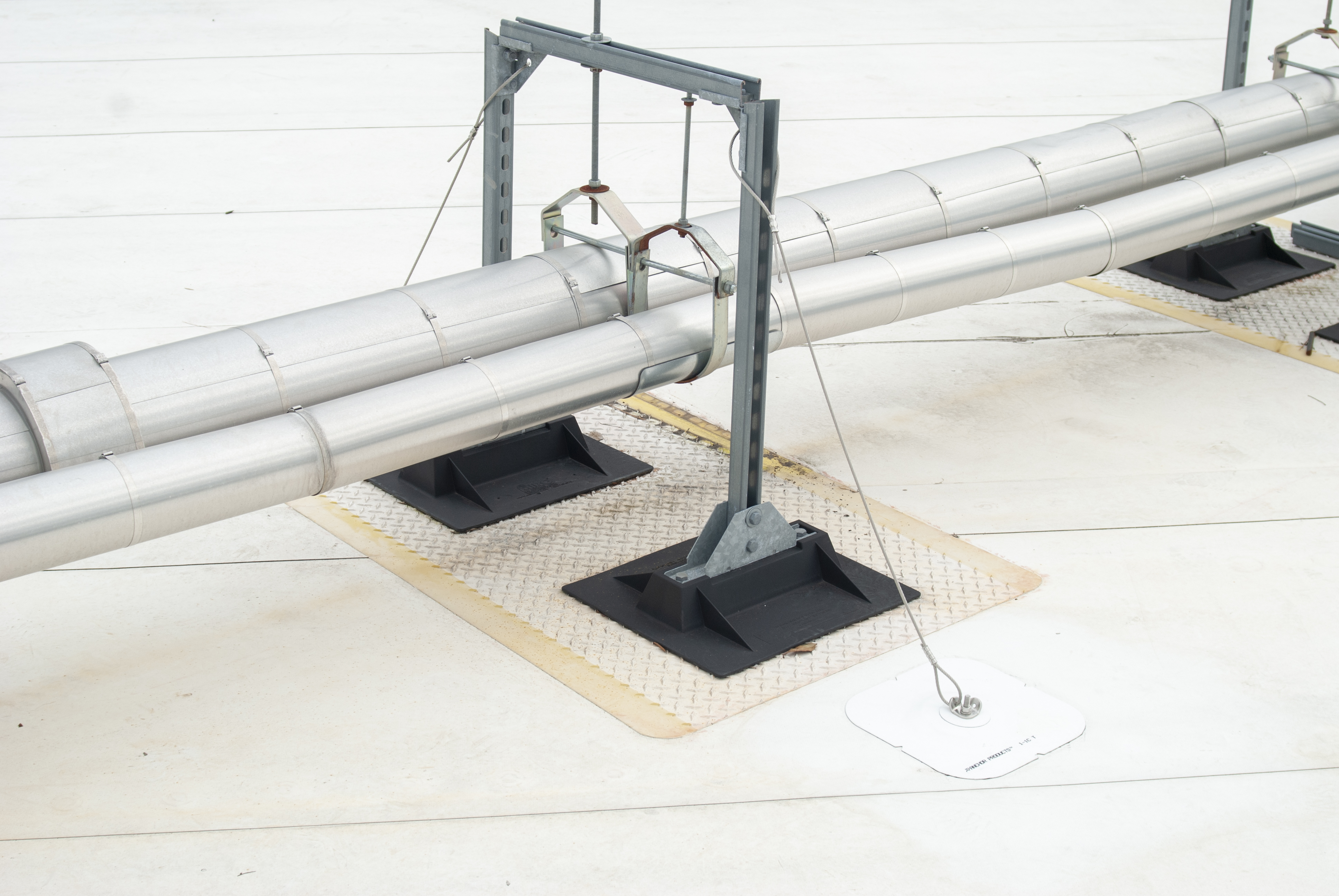 Insulated pipe runs on Compression-Free™ supports